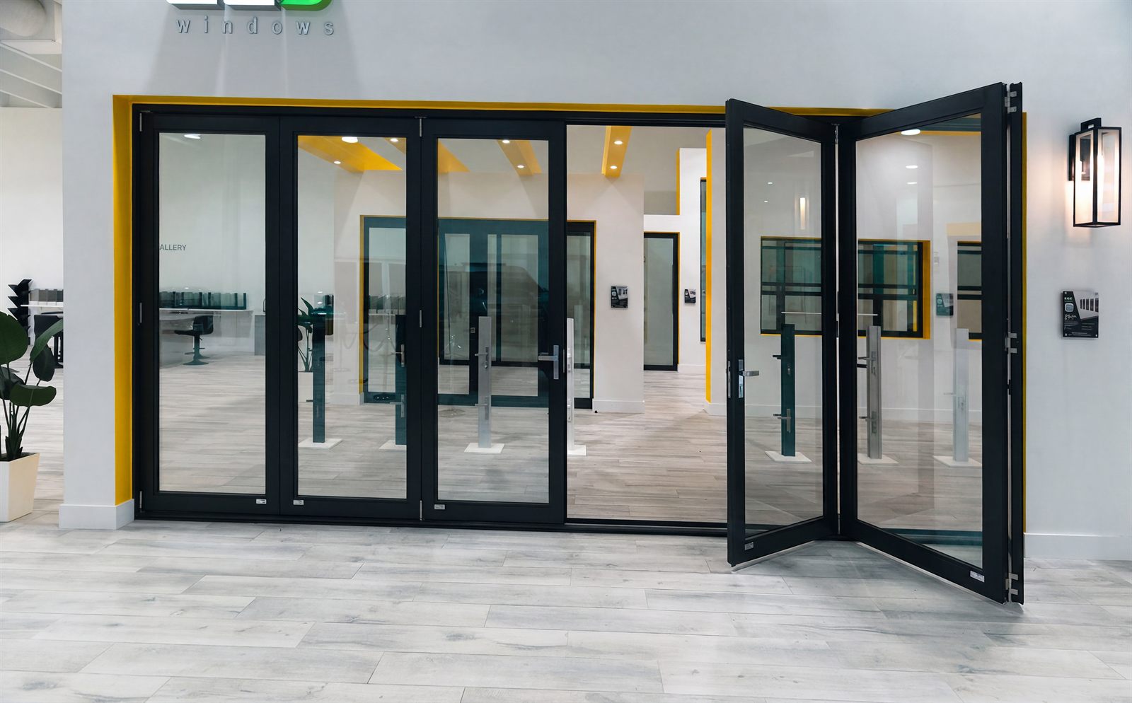Impact-rated sliding patio doors with laminated glass