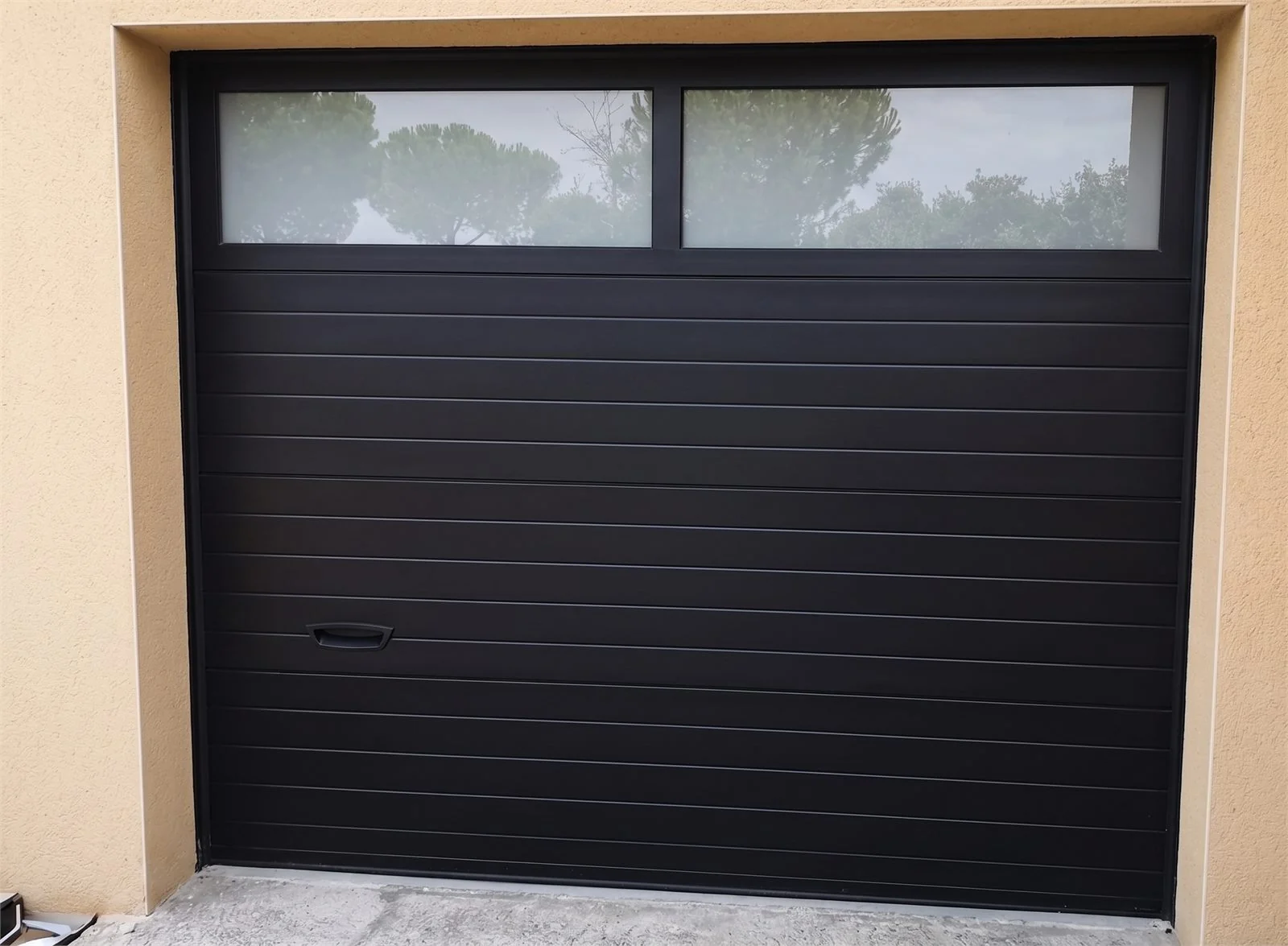 Wind-rated impact garage door on a Florida home