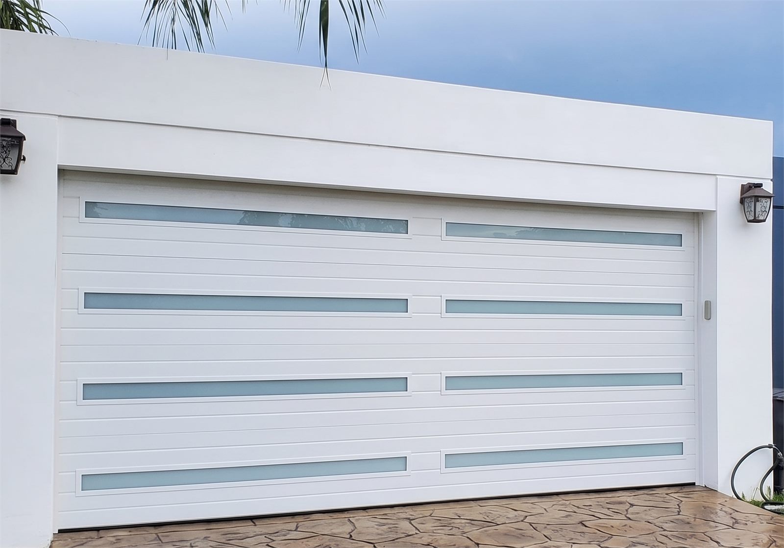 American-made impact-rated garage door installed by GlassIQ