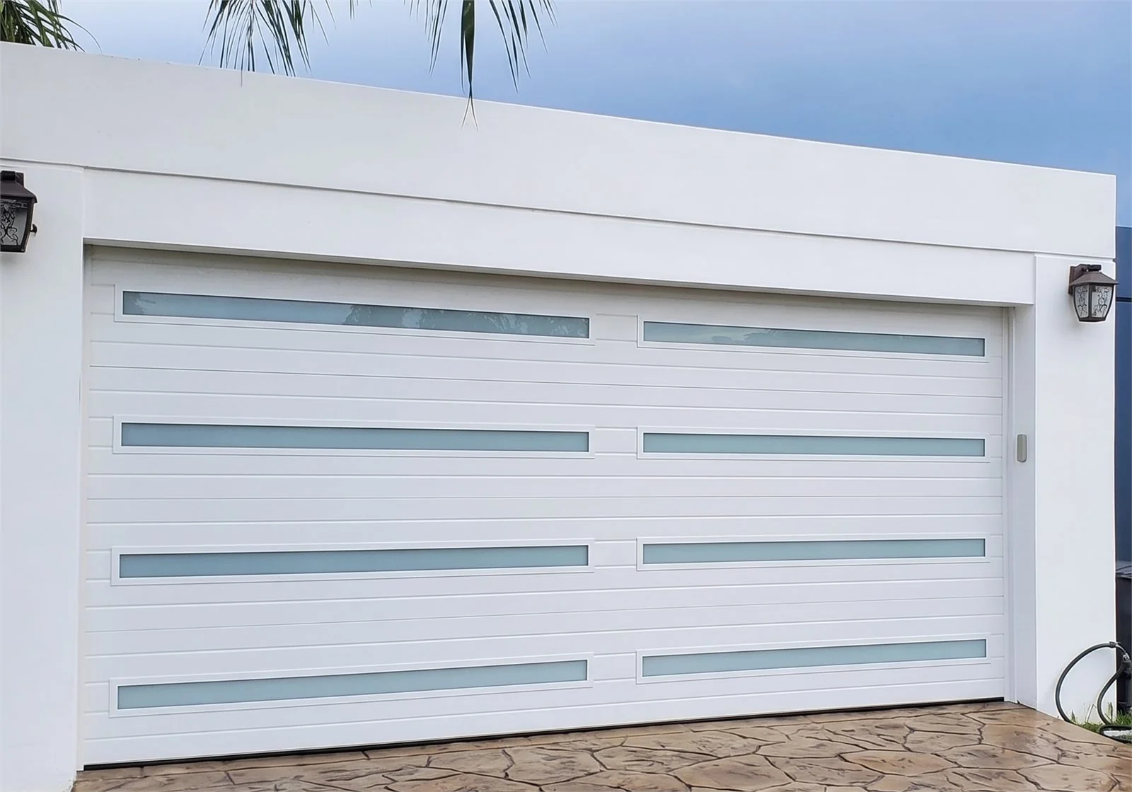 American-made impact-rated garage door installed by GlassIQ
